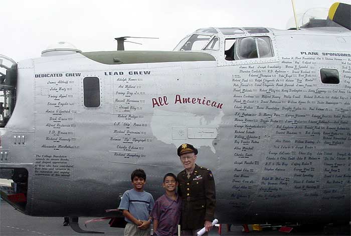 Jean Vandruff (at 80) with grandsons Eric (10) and Shane (9).  He still fits into his uniform!