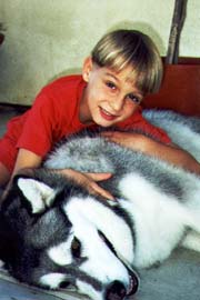 Boy Hugging Dog 